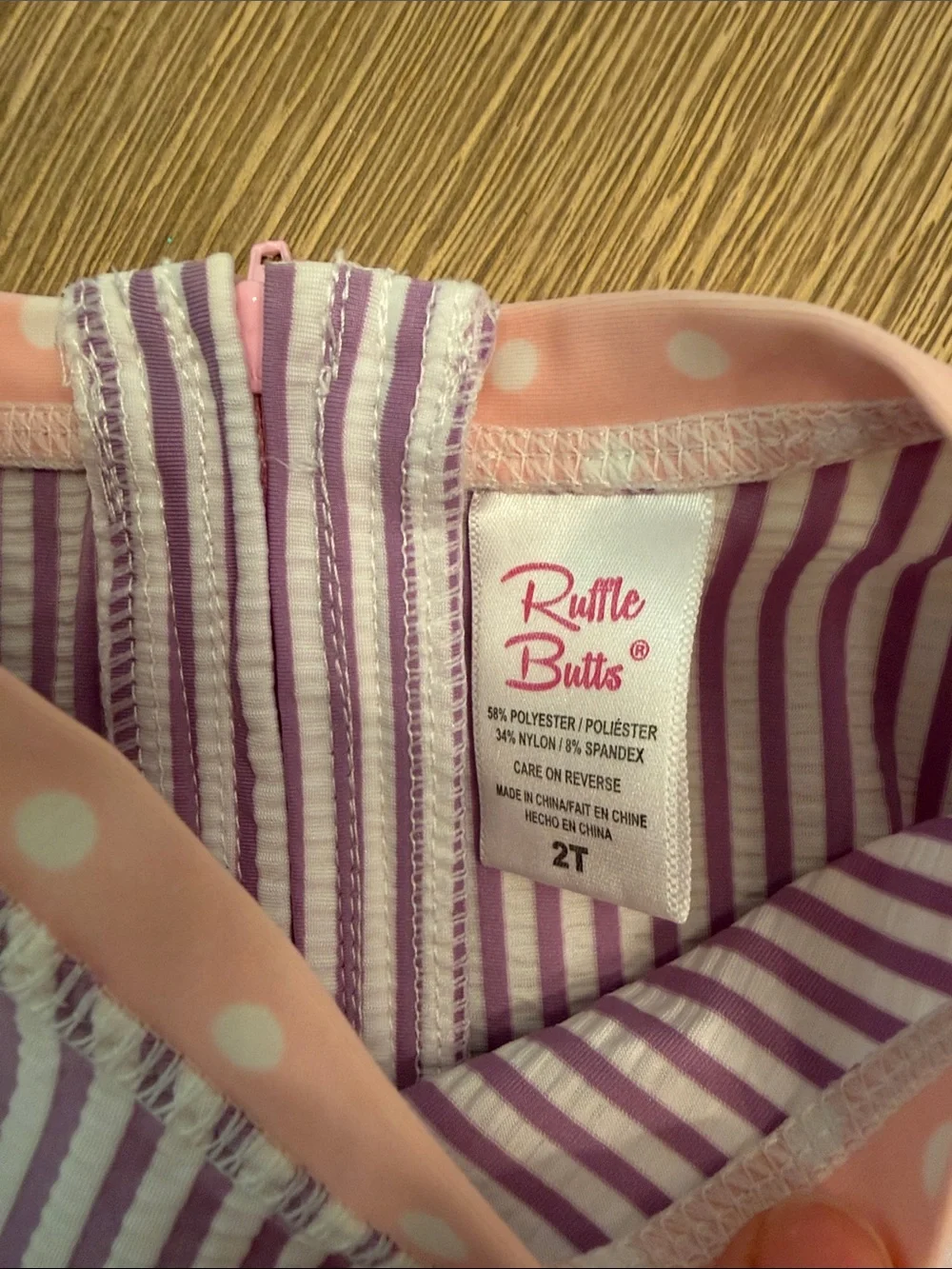 RuffleButts Seersucker Rash Guard One Piece